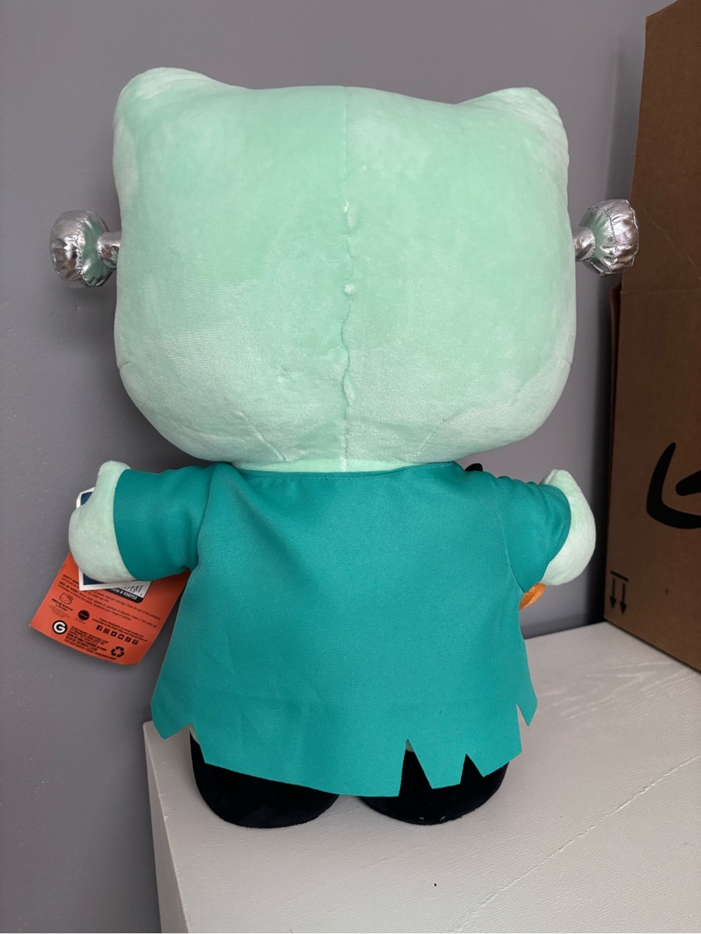 Hello Kitty Mint Green Frankenstein Plush with Pink Bow and Orange Pumpkin - Picture 3 of 3